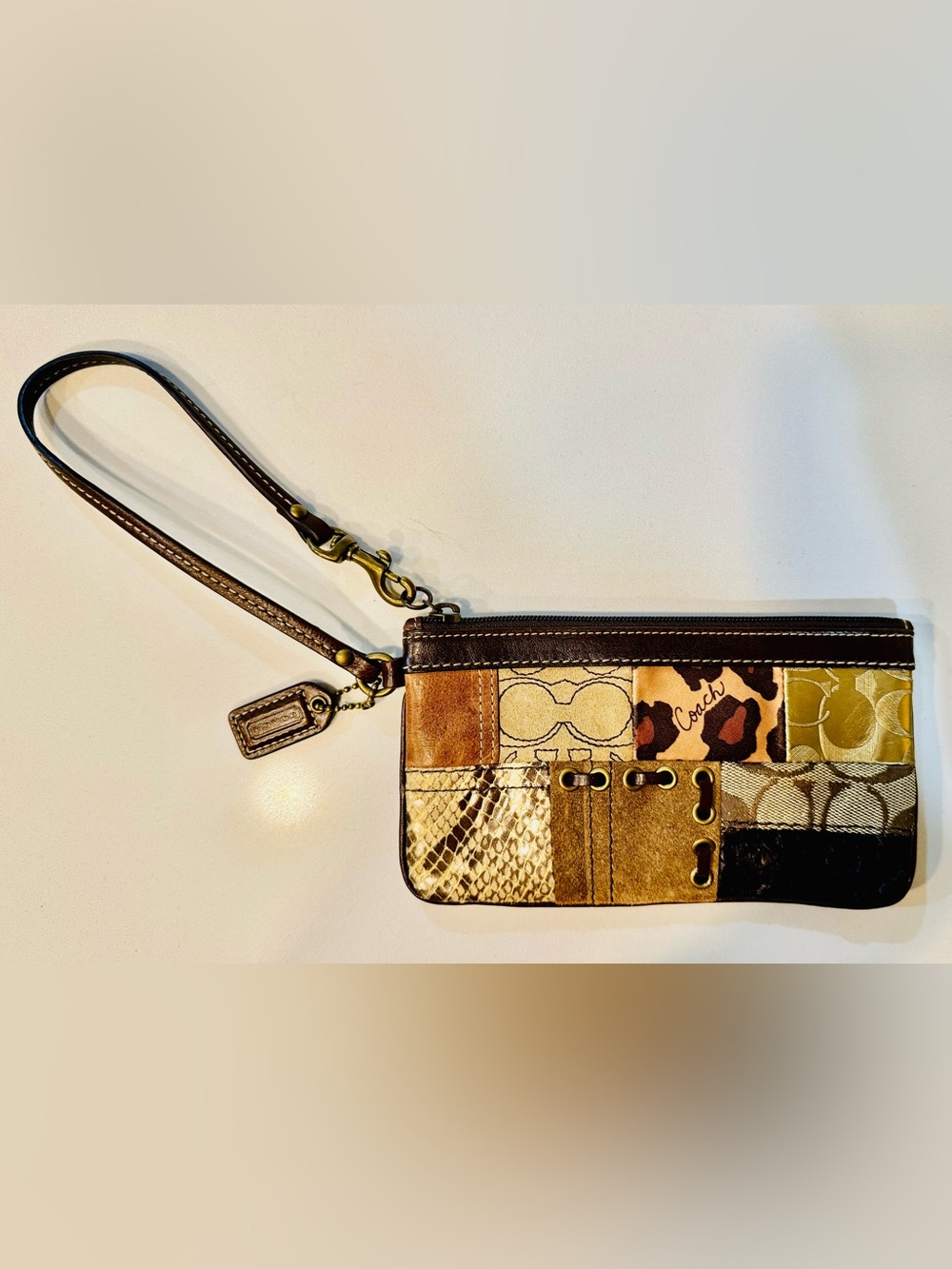 Coach Patchwork Wristlet in Brown and Tan_Almost like a new bag